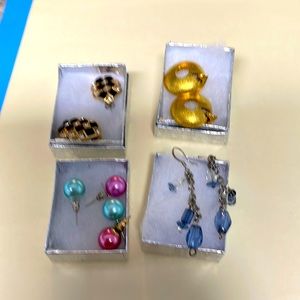 5 pair of earrings all different colorful casual to sophisticated very nice